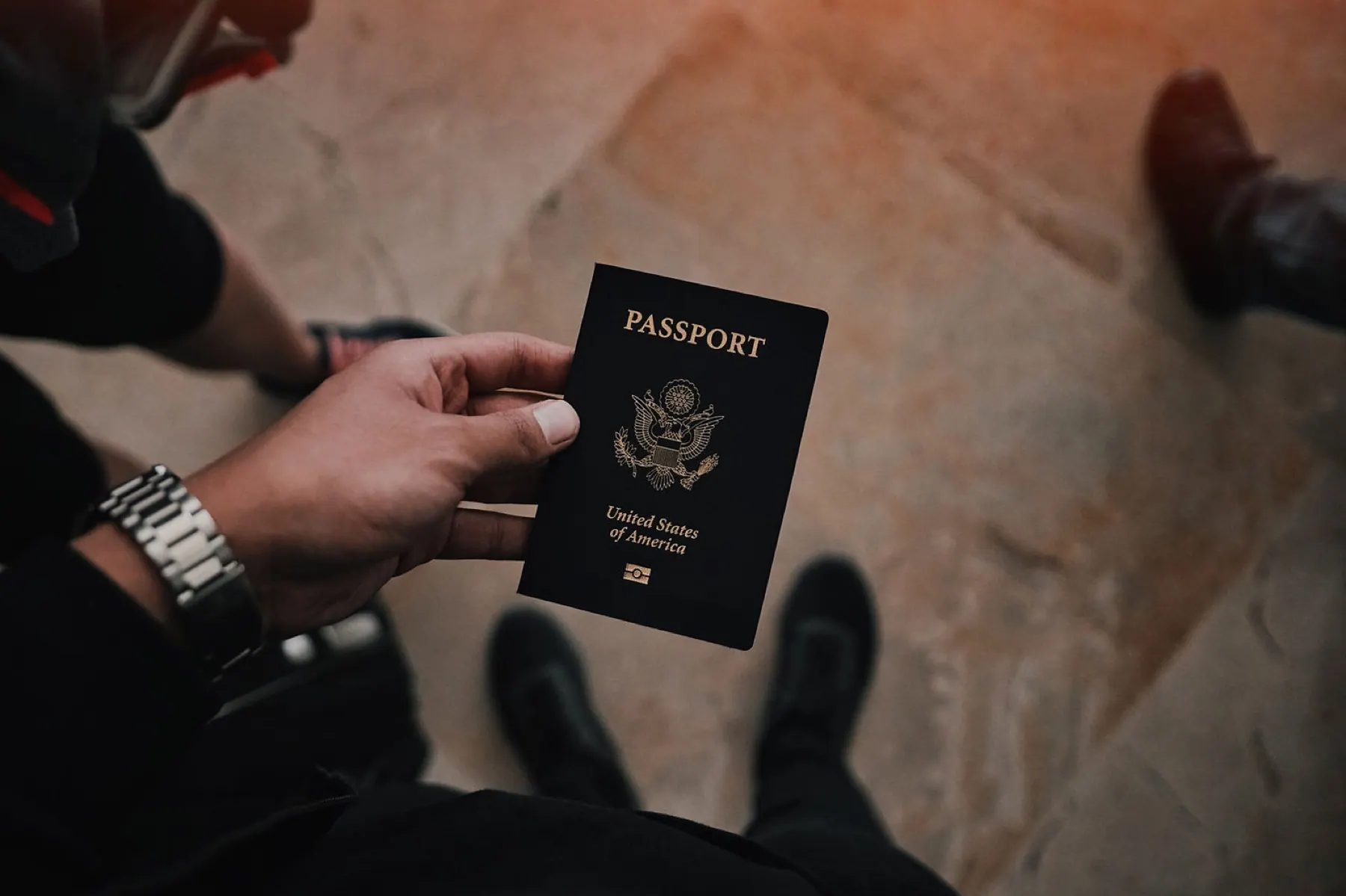 A traveler holding a United States passport