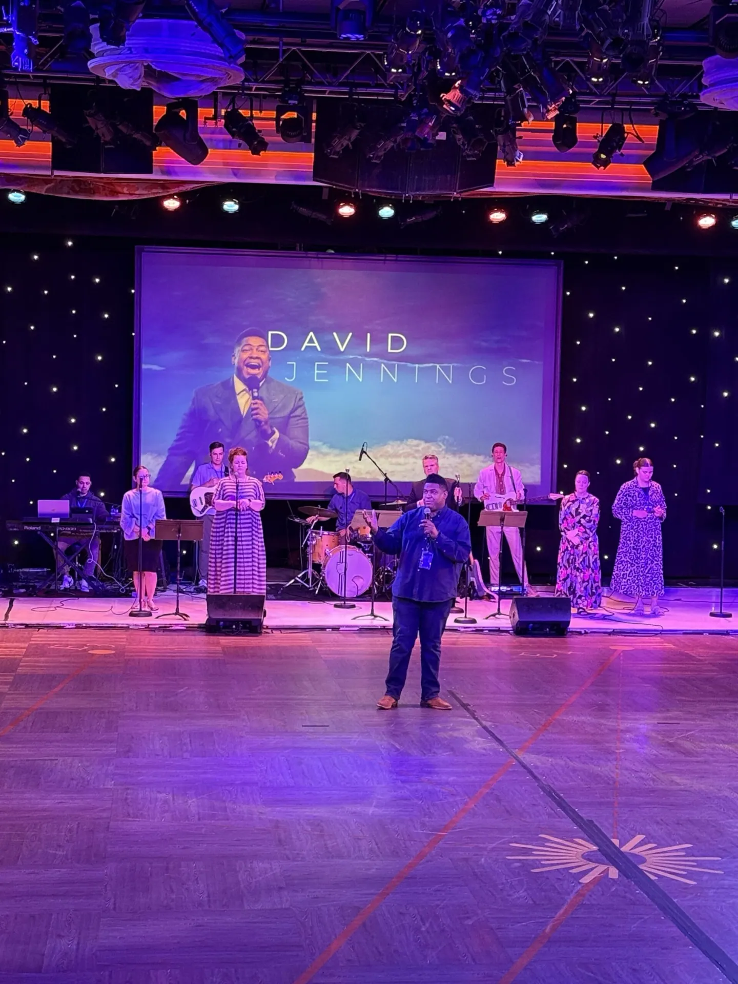 A concert with a full band and singers